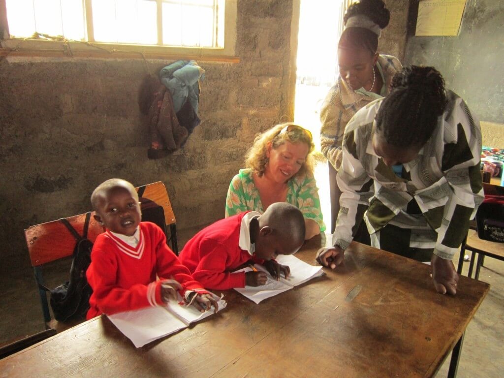 Sara Baker with students in Kampi Ya Moto