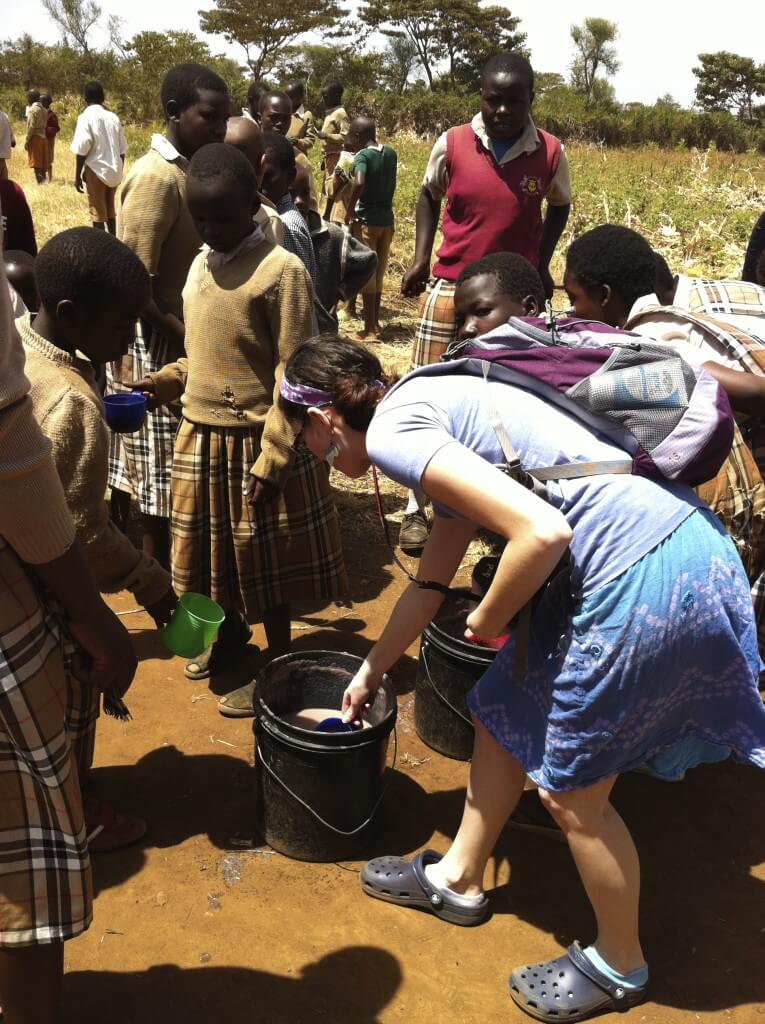 Autumn Benjamin helps out with the orphan lunch program in Kampi Ya Moto