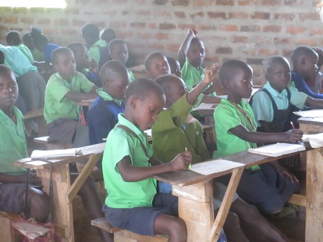 challenge of being in class without a uniform - children fitting in with their classmates