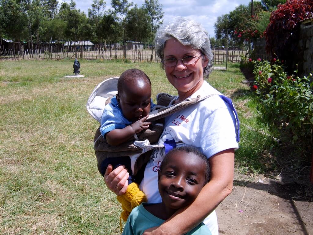 missionary with Kenyan children