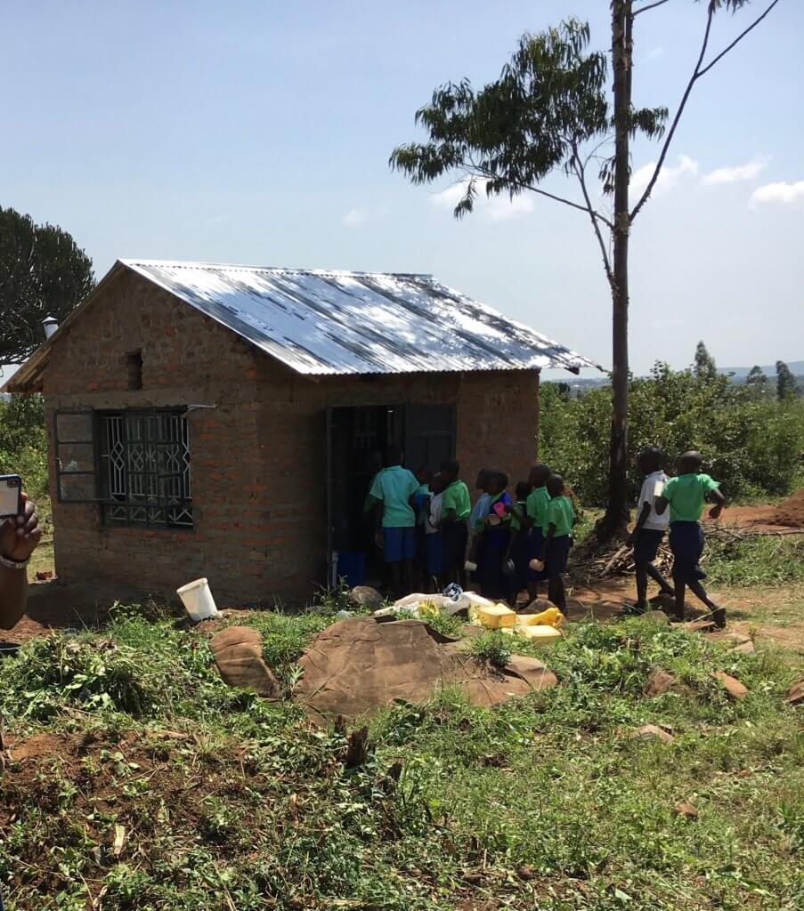 a small brick building used as a kitchen at Miruya Primary School in Kenya