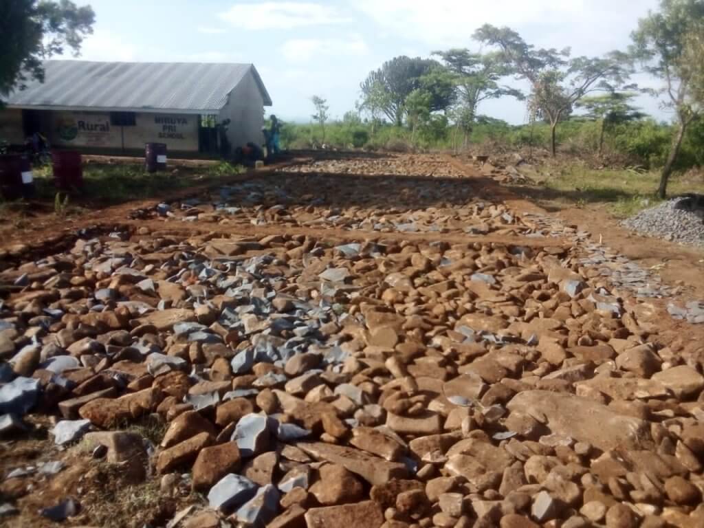 Stones arranged on the ground for the fresh start of a new classroom foundation
